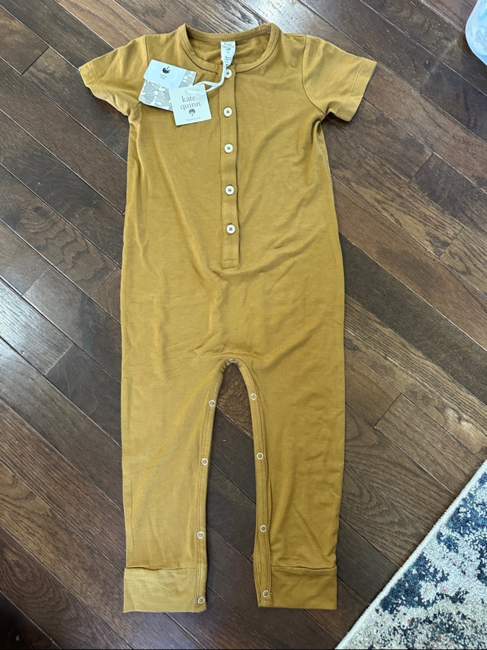 Kate Quinn short sleeve sport union suit
